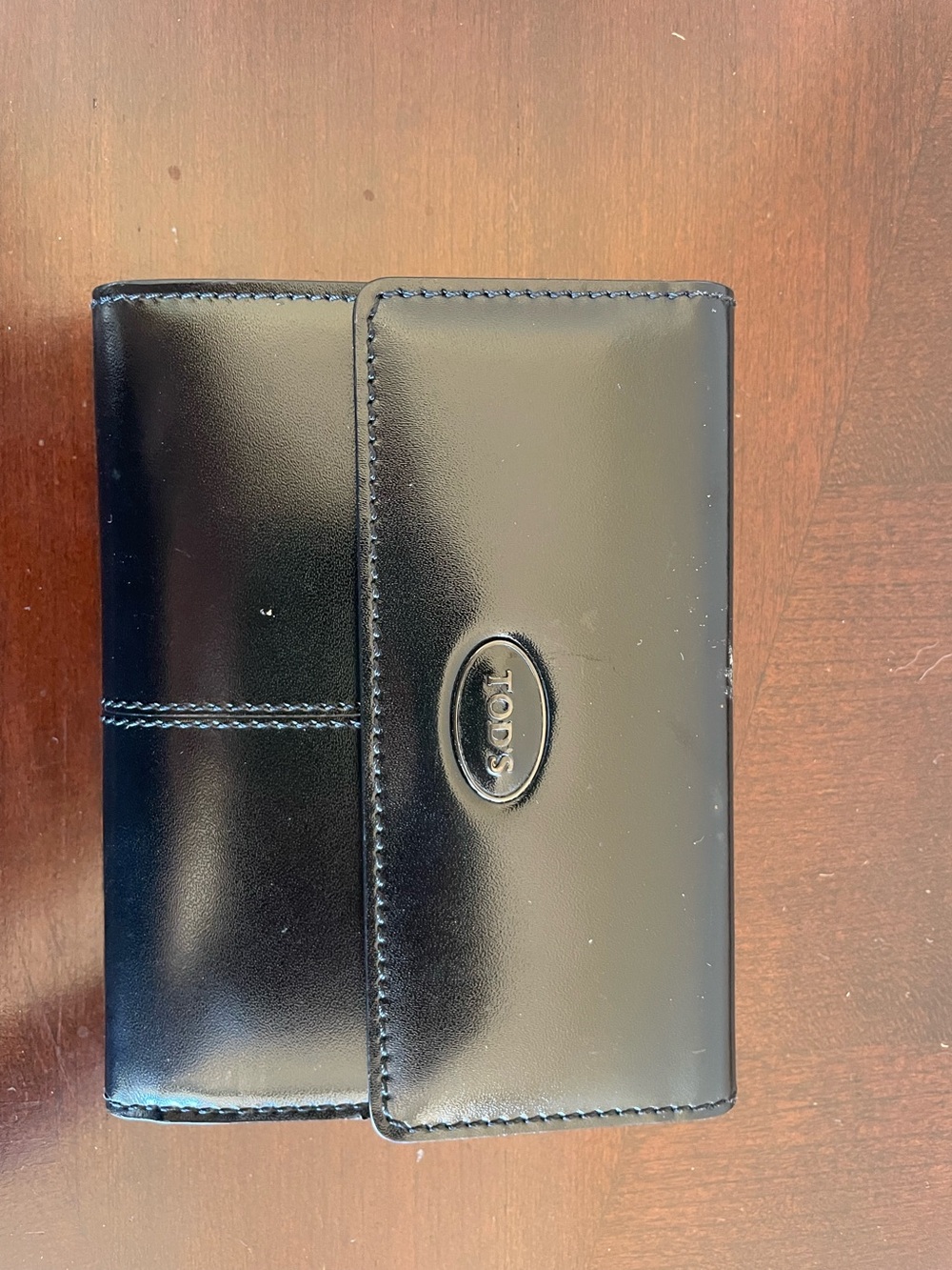 Tod's Black Gloss Leather Wallet with Logo Plaque